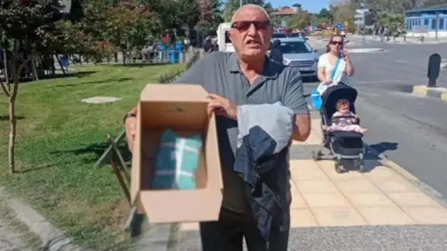 Torununun cenazesini bisküvi kutusunda aldı