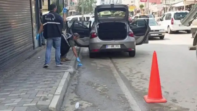 Bir kadın arabasıyla geçerken bir saldırıdan seken kurşunlarla hayatını kaybetti