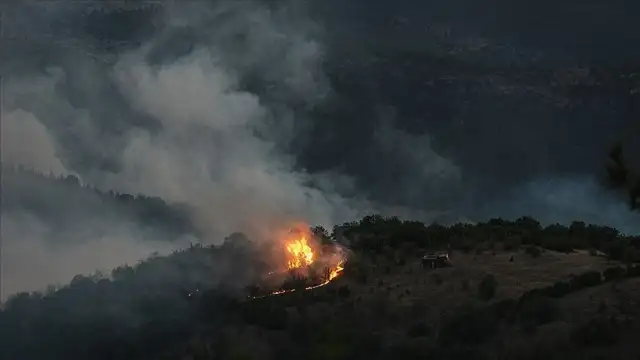 Bursa-Balıkesir sınırında çıkan orman yangınına müdahale sürüyor