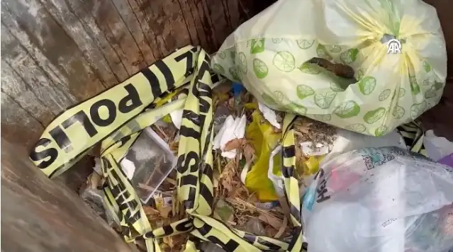 Çöpte vücudunda yanık ve kesikler olan bebek cesedi buldu